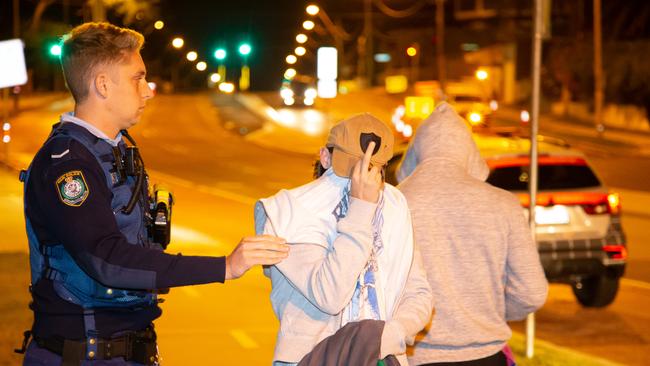 A number of teens had to be pulled off the bus after the driver called the police. Picture: Damian Hofman