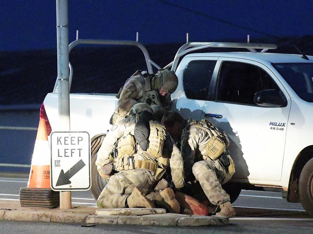 A man is held down by police in Darwin. Picture: Keri Megelus