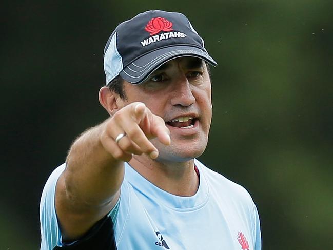 SYDNEY, AUSTRALIA - MARCH 15: Waratahs head coach Daryl Gibson speaks to players during the Waratahs Super Rugby training session at Kippax Lake on March 15, 2016 in Sydney, Australia. (Photo by Mark Metcalfe/Getty Images)