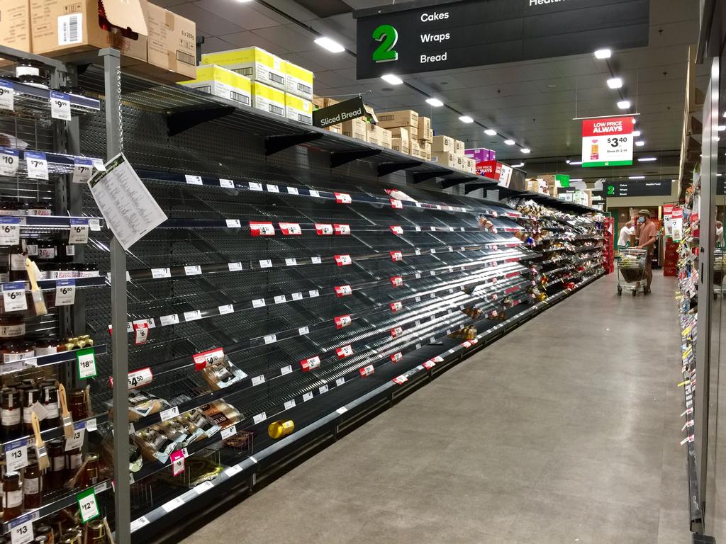 Shelves stripped bare at Mona Vale Woolworths Mona Vale. Picture: Monique Harmer.