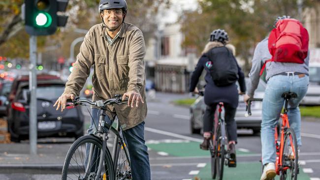 Anthony De Silva, owner of bike shop I am Free, on the bike lane at the corner of Rathdowne Street and Faraday Streets, Carlton. Picture: Tim Carrafa