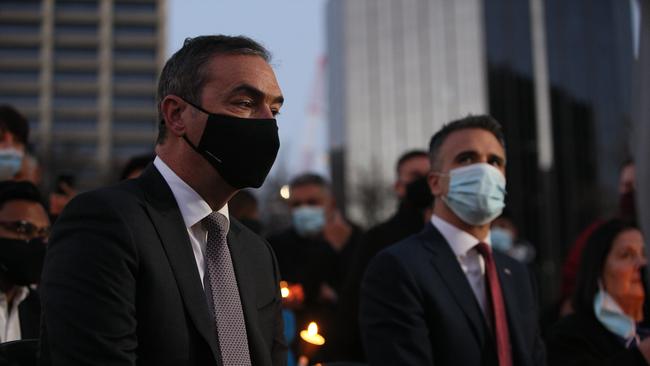 Premier Steven Marshall and Labor Leader Peter Malinauskas at an August candle light vigil, held to show solidarity with the people of Afghanistan. Picture: Emma Brasier