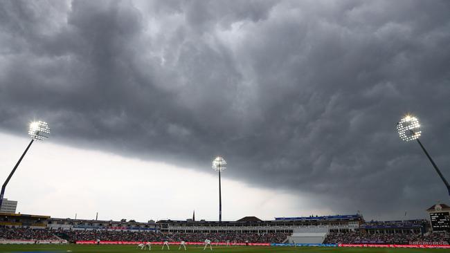 Australia bowl under heavy cloud cover before the second rain delay of the day. Picture: Getty