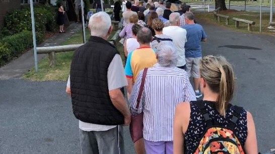 Residents line up at Labrador to turn up a meeting on the council's City Plan organised by Bonney MP Sam O'Connor.