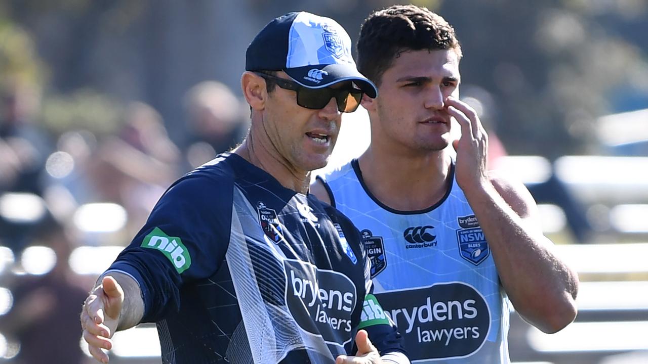 NSW Blues head coach Brad Fittler speaks with Nathan Cleary.