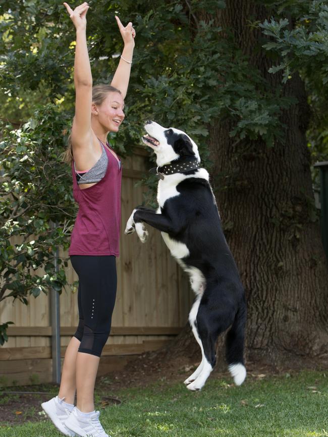 Tanisha Ivanoff, 14, with her dog. Picture: AAP Image / Julian Andrews).