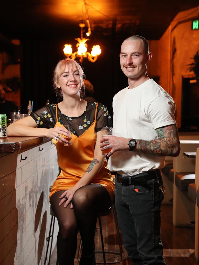 Small bar Coal &amp; Cedar bar in Newcastle (pictured Erin Smith and Sean Gaddes) will look to benefit from a six month trial to relax restrictions. Picture: Richard Dobson