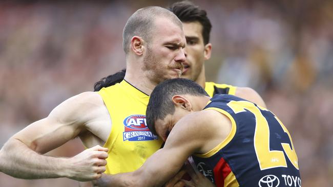 Charlie Cameron wraps up Kamdyn McIntosh during the grand final. Picture: Sarah Reed