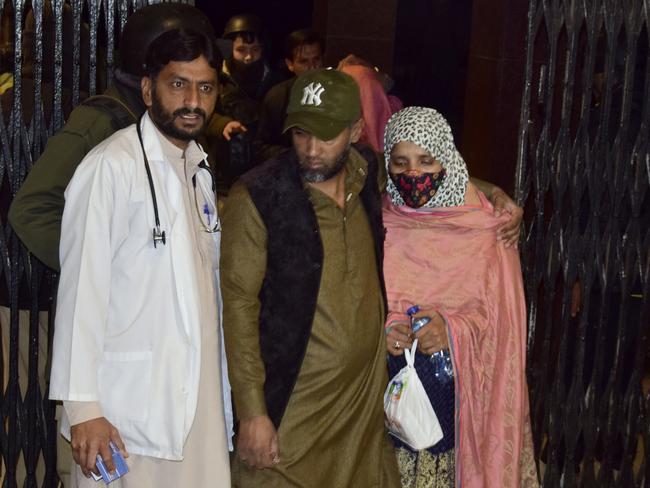 Passengers rescued by security forces from a passenger train attacked by insurgents arrive at a railway station in Quetta, Pakistan, Wednesday, March 12, 2025. (AP Photo/Arshad Butt)