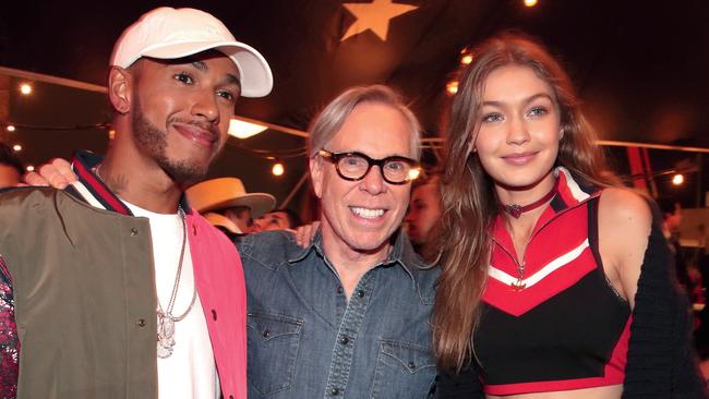 Hilfiger with Lewis Hamilton and Gigi Hadid in 2017. Picture: Christopher Polk/Getty Images for Tommy Hilfiger