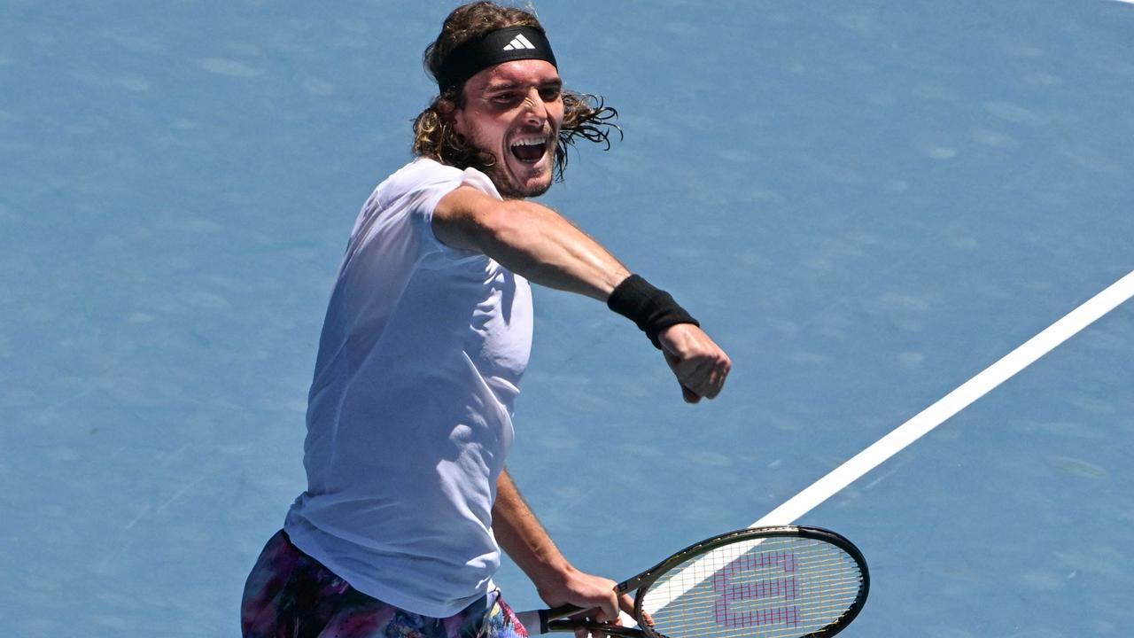 Greece's Stefanos Tsitsipas celebrates after victory against Netherlands' Tallon Griekspoor.