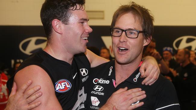 AFL Round 12. 08/06/2019. Carlton v Brisbane Lions at Marvel Stadium, Melbourne. Interim coach David Teague gets a hug of Mitch McGovern   .  Pic: Michael Klein