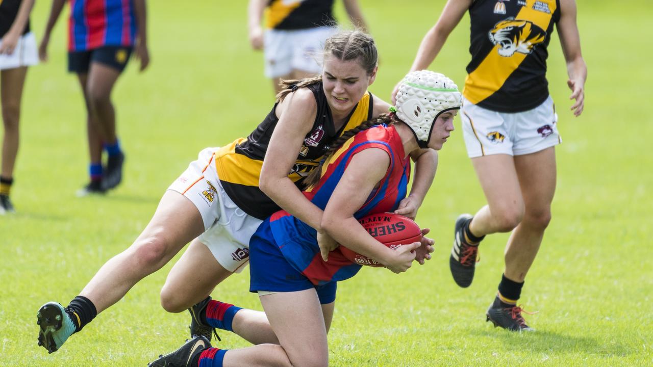 Lara Paget (left) of Toowoomba tackles Lauren Fraser of Downlands. Picture: Kevin Farmer