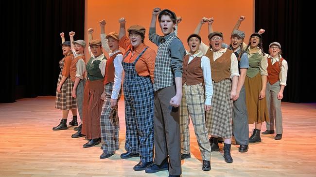 Students from the Toowoomba State High School's Academy of Performing Arts with put on performances of Newsies at the school's Performing Arts Centre at the weekend, with Luke Parker (centre) playing the lead role of strike leader Jack Kelly.