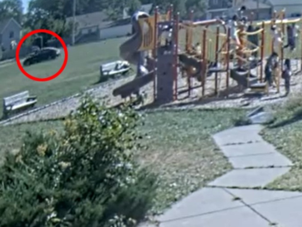 The black car could be seen driving on the grass three times. Picture: Minneapolis Police