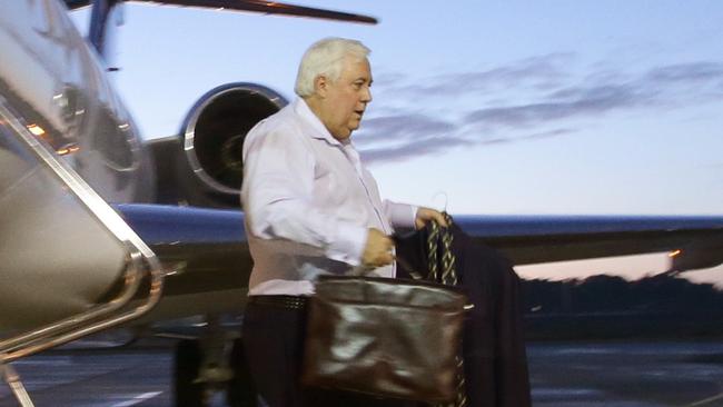 Clive Palmer leaving his private jet after arriving in Melbourne for the 2013 Palmer United Party launch. Picture: Jamie Hanson