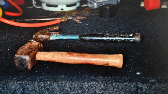 Blood-stained hammers that the prosecution alleged were used in the attack.