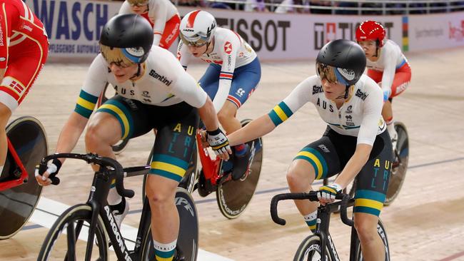 Australia's Amy Cure and Australia's Annette Edmondson hand over during the women's 30km Madison final at the UCI track cycling World Championship at the velodrome in Berlin on February 29, 2020. (Photo by Odd ANDERSEN / AFP)