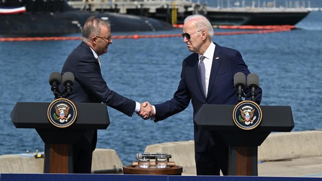 Joe Biden and Anthony Albanese shake hands over the AUKUS pact. Picture: Getty Images.