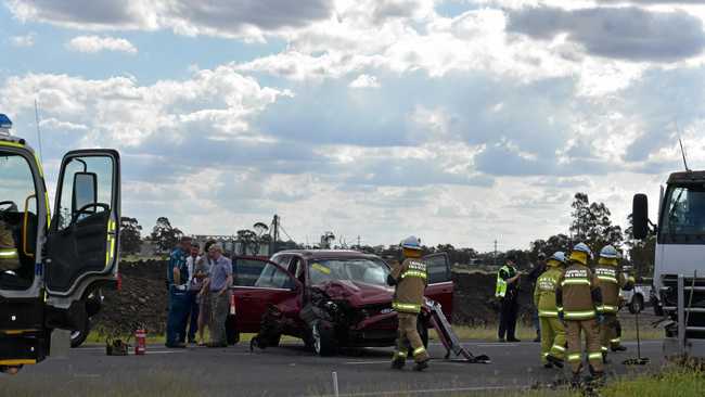 CRASH: A car and truck have come together on the Warrego Highway, closing the road. Picture: Michael Doyle