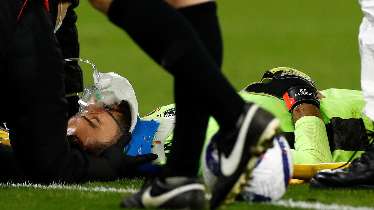 Wolves goalkeeper Rui Patricio was treated for nearly 15 minutes on the field. (Photo by JASON CAIRNDUFF / POOL / AFP)