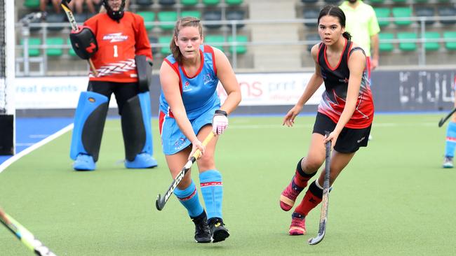 Cairns Hockey. Saints v Souths women on Rainforest Turf. Saints’ Kayla Devlin and Souths’ Bella Cochran. PICTURE: STEWART McLEAN