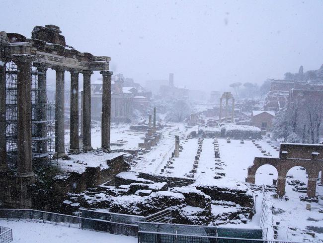 This photo taken on February 26, 2018 shows the Ancient Forum during a snowfall in Rome. Picture: AFP