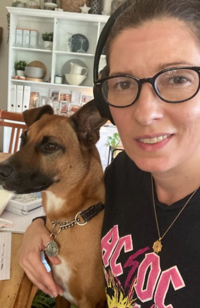 Claire Sowden at her kitchen table, where she helped co-ordinate search and rescues and get information to people stuck in the flood zone.