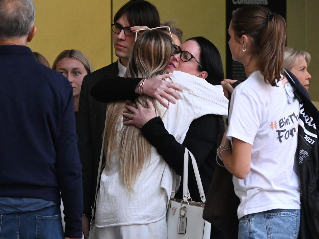 Kerry-Lin Stewart, mother of 16 year-old stabbing victim Balin Stewart, hugs a witness as she and supporters leave the Supreme Court. Picture: Dan Peled / NCA NewsWire