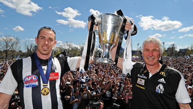 Collingwood Grand Final celebrations at Gosch's Paddock in 2010. Nick Maxwell and Mick Malthouse with the premiership cup.