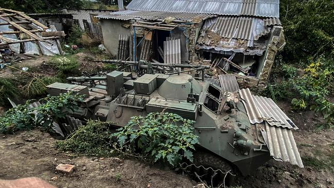 An abandoned Russian armoured personnel carrier near a village on the outskirts of Izyum, Kharkiv Region, eastern Ukraine. Picture: AFP