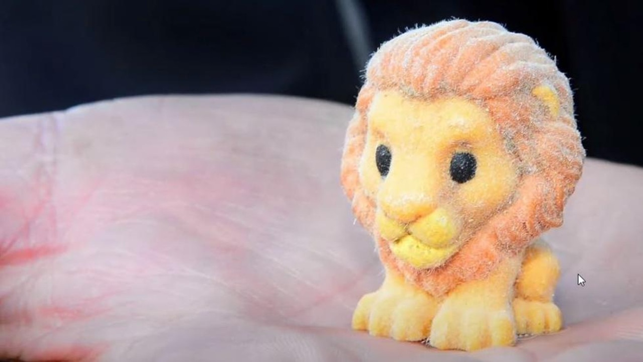 A rare furry Simba Ooshie (pictured) was beheaded on breakfast TV as a protest against online abuse. Woolies says the popular promotion has bolstered a sales surge. Image: Supplied.