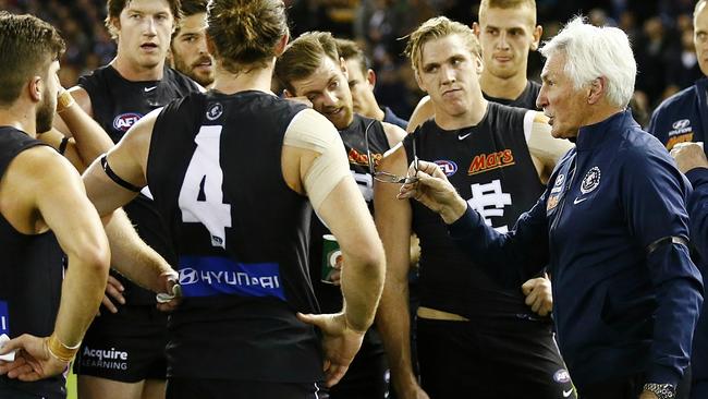 Mick Malthouse speaks to his players during a break against Geelong. Picture: Wayne Ludbey