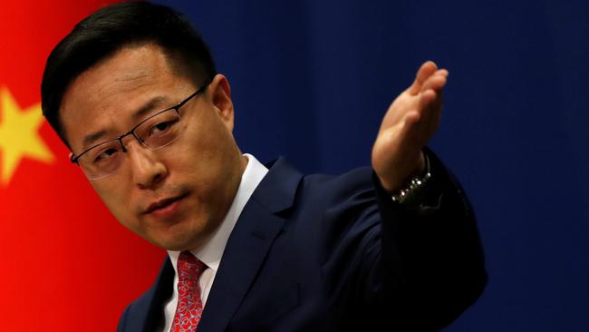 Chinese Foreign Ministry spokesman Zhao Lijian speaks to reporters in Beijing. Picture: Reuters.