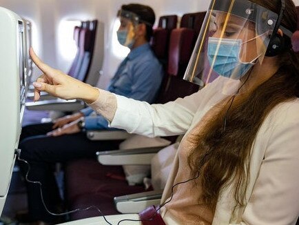 The future face of travel. Qatar Airways has made it mandatory for economy-class passengers to wear a protective face shield while flying.