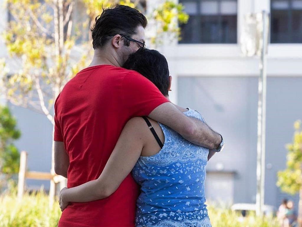 Residents Ehsan and Saghar Jahanandish after they were evacuated from the Opal Tower.