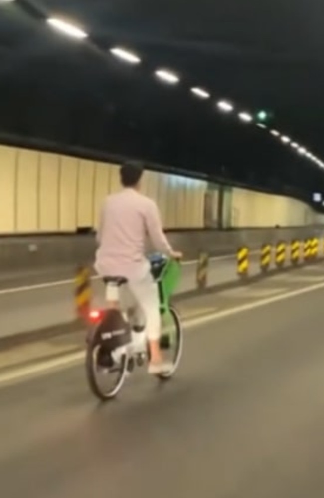 A man rides his rented e-bike in Sydney’s cross-city tunnel. Picture: TikTok