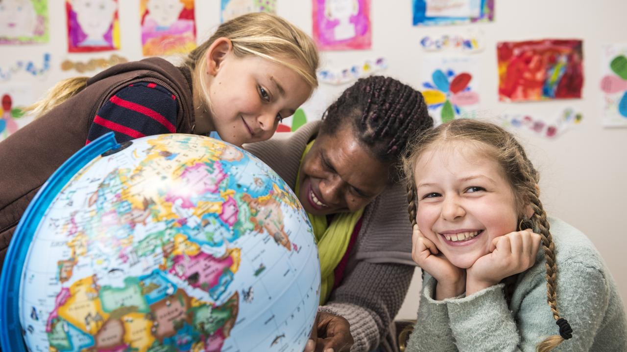 AROUND THE WORLD IN THREE HOURS: Bonjour Toowoomba is taking visitors on a world trip at their open day later this month. French immersion students David Maddon, teacher Evelyne Malau and student Ruby-Jean Phillips at Bonjour Toowoomba. Picture: Kevin Farmer