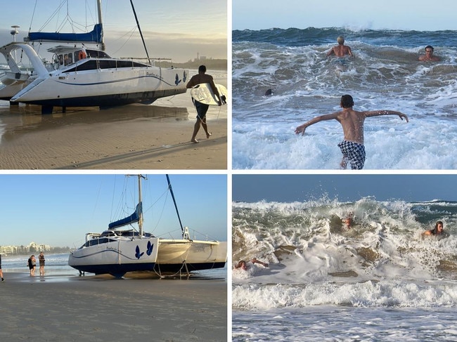 Catamaran runs aground as swell lashes coast