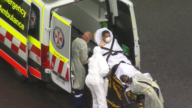 A sick crew member on the Ruby Princess is taken off the ship and to a Sydney hospital for treatment. Picture: 7News