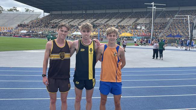 The 3000m winner Jack Coomber (St Laurence's), middle with Padua's Cooper Carswell (Second) and Ashgrove's Asher Parkin (third). Coomber later won the 800m.