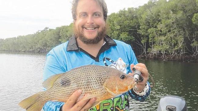 Blake Readett with his 43cm goldie, which he landed at Maningrida