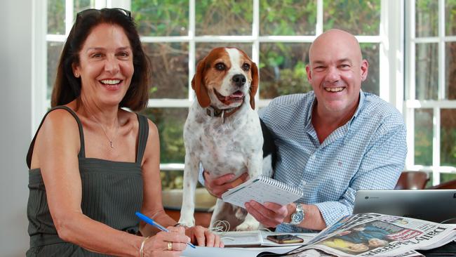 Happy tale … Matthew Benns with his best mate and their boss at home. Picture: Justin Lloyd