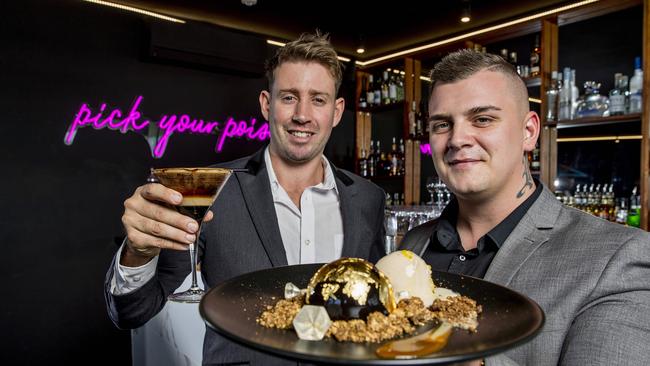 Infinite Dessert Bar owners Matthew Hartnett holding a Golden Espresso Martini and Kye Sheehan holding a 24K gold dessert. Picture: Jerad Williams