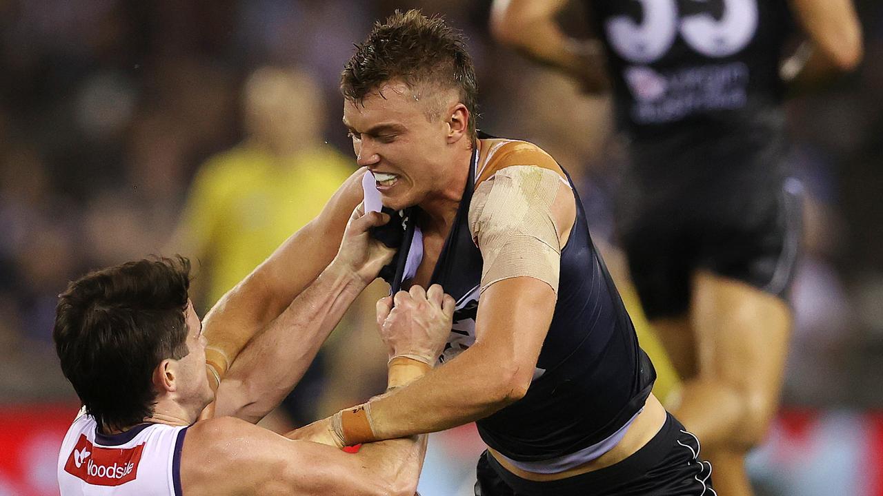 Patrick Cripps of the Blues and Andrew Brayshaw of the Dockers get to know each other. Picture: Michael Klein