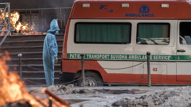 ‘The situation is grim’: The body of a COVID victim is delivered to a crematorium in New Delhi on Saturday. Getty Images