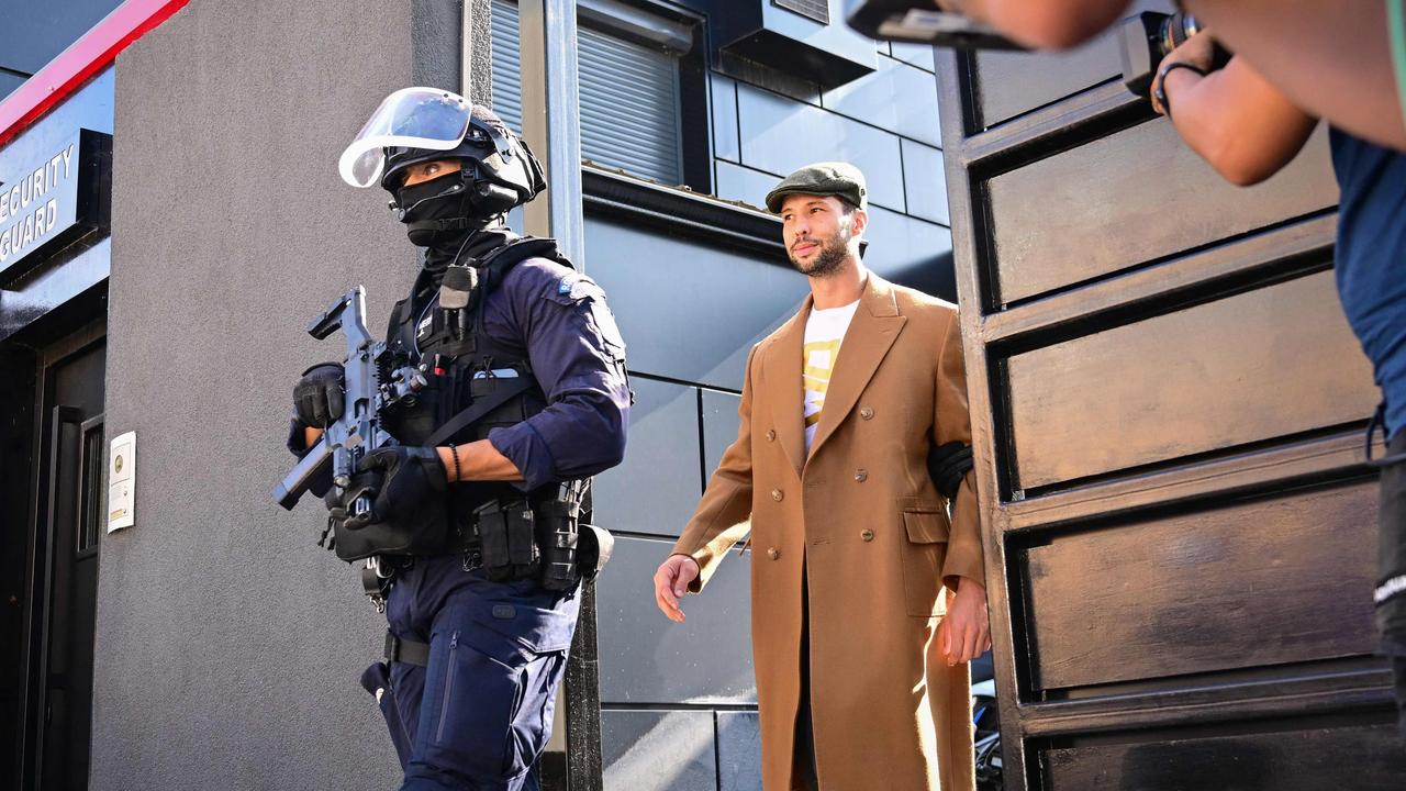 Tristan Tate was also detailed following the raid. Picture: Daniel Mihailescu/AFP