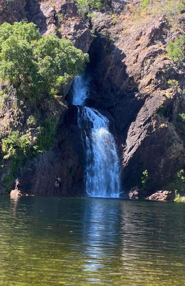 Swimmers stranded after a croc sighting and attack at Wangi Falls. Picture: Michael Hickman