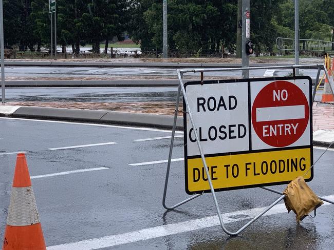 Somerset Drive Mudgeeraba on the Gold Coast is closed to all traffic after it was inundated with flood water after heavy rainfall fell over the City. NCA NewsWire / Scott Powick