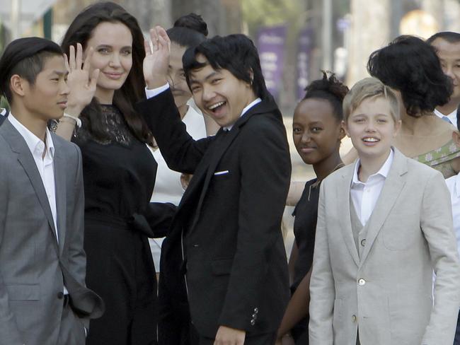 Angelina Jolie with her children (left to right) Pax, Maddox, Zahara and Shiloh while they wait to meet Cambodia's King Norodom Sihamoni in Siem Reap province, Cambodia, Saturday, Feb. 18, 2017. Picture: AP Photo/Heng Sinith
